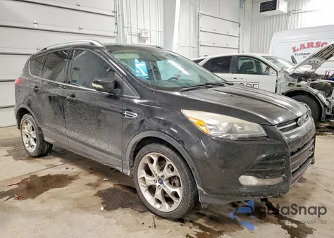 2015 Ford Escape Titanium z USA, uszkodzony, nr VIN 1FMCU9J90FUC02790